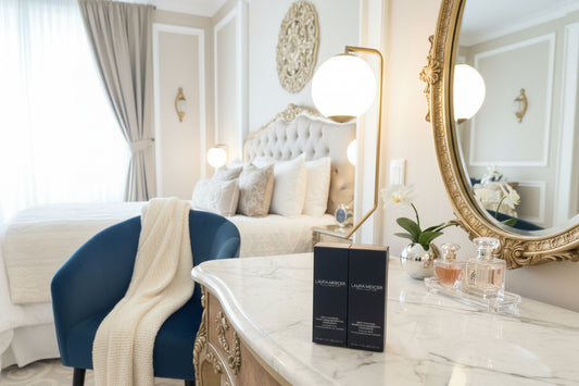 Two boxes of Laura Mercier foundation 